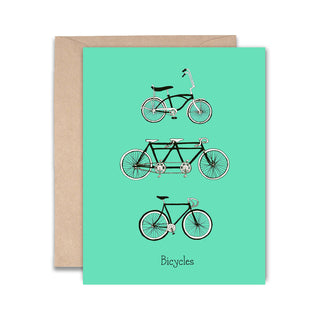 Greeting card with illustrations of bicycles on a teal background, with brown envelope.