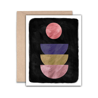Greeting card with geometric shapes on a black background, featuring a pink, purple, and gold circle design.